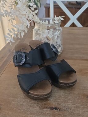 Dansko Black Leather Slide Mules with Western Buckle